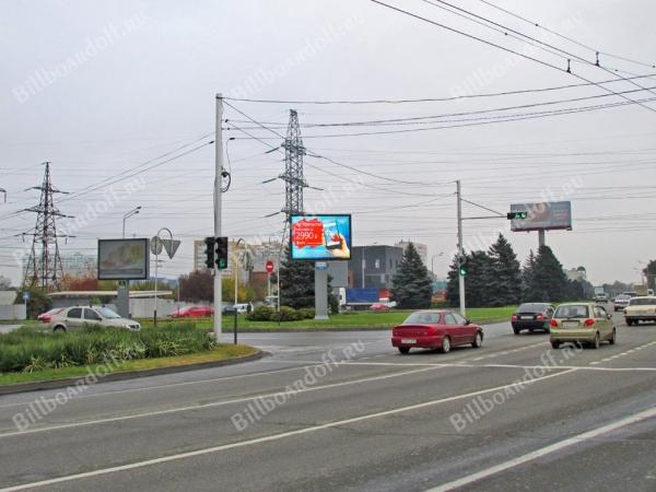 Мачуги ул., 9/1 (на разделительной полосе, позиция 1)