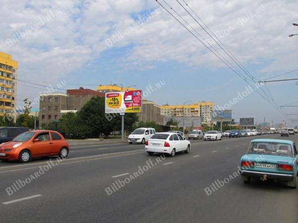 Дзержинского ул., 209 (на разделительной полосе)