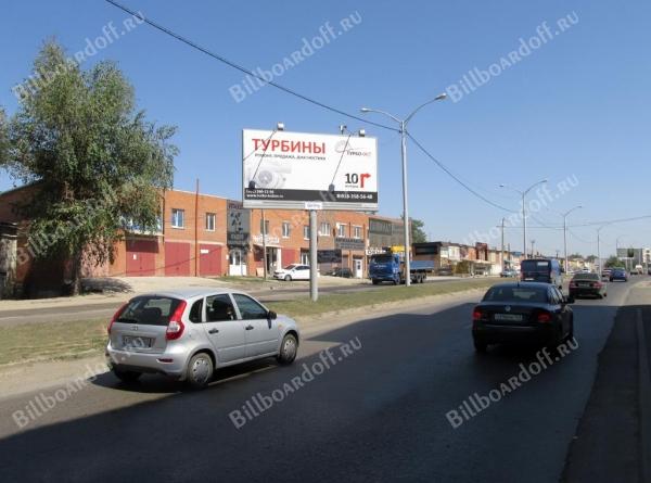 Уральская ул., 210 (на разделительной полосе) (из города)