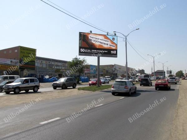 Уральская ул., 212/11 (на разделительной полосе) (в город)